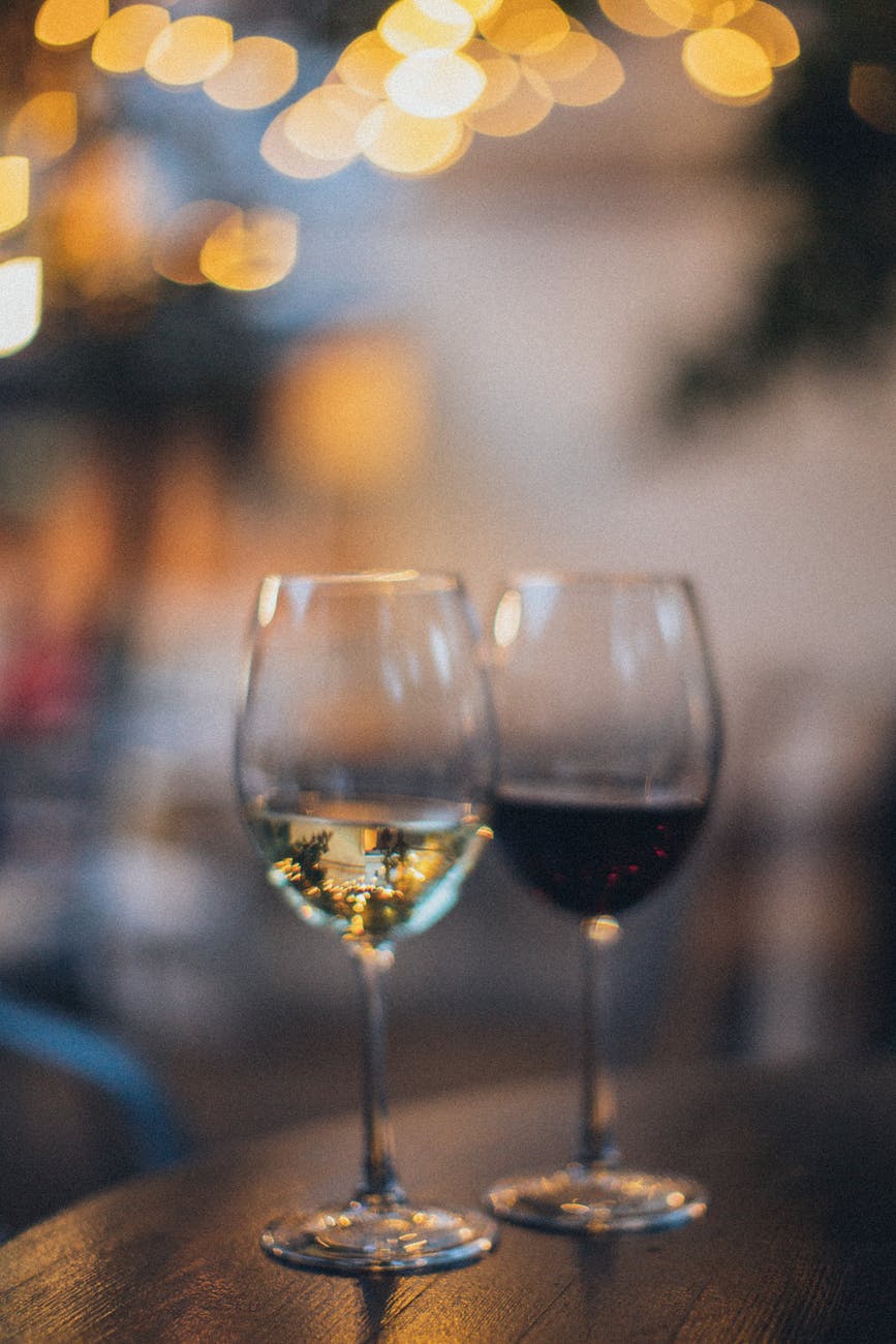 shallow focus photo of two wine glass